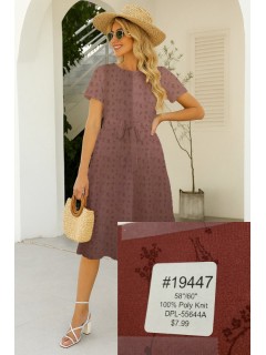 19447 A closely-woven polyester knit fabric with a slightly textured, ribbed surface. The fabric has a subtle, mottled appearance with some darker maroon accents throughout. Rusty red
